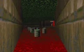 E1M8 behind barrels.png