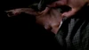 Bloodied Billy Miles' neck