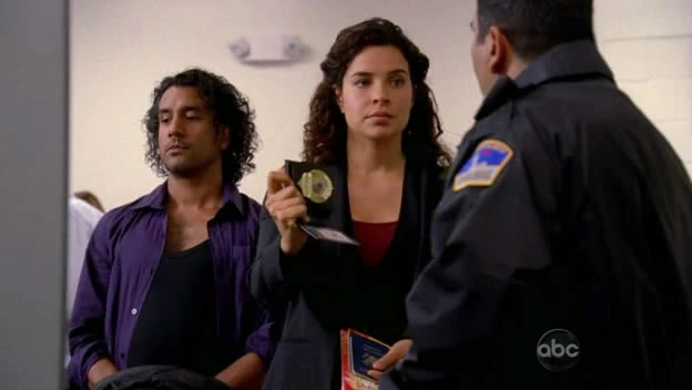 5x06-ilana-escorting-sayid.jpg