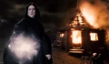 Snape with Hagrid's hut burning HBP.jpg