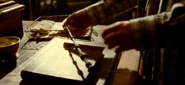 Harry Potter holding the Elder wand