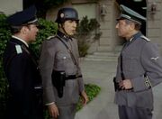 Kirk and Spock confronted by Ekosian SS Major