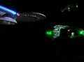 USS Enterprise-D and Romulan warbird contend for a Romulan scout ship.jpg