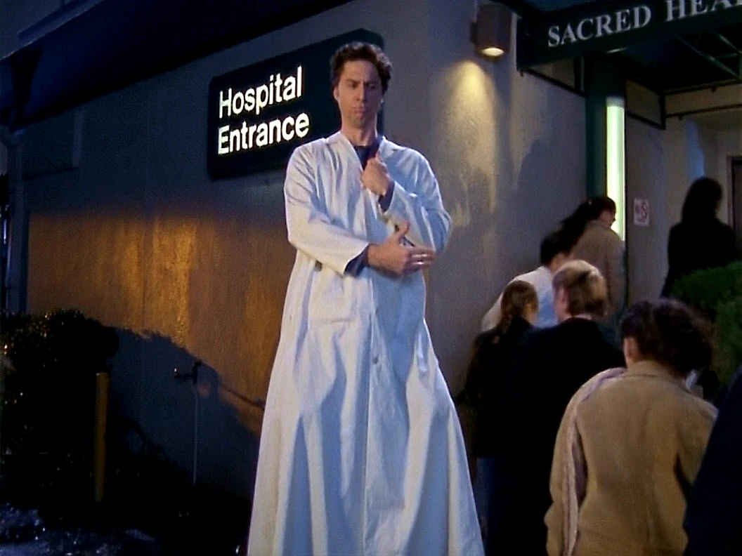 Why doesn't JD wear a lab coat after he an attending? r/Scrubs