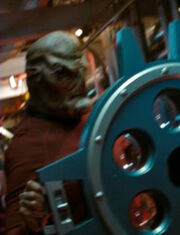 Tall alien cadet in torpedo bay