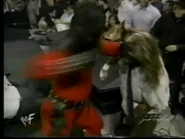 Fake Kane punches Mankind