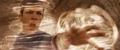 Spock alt reaches for his mother.jpg