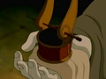 Iroh holding out the headpiece.png