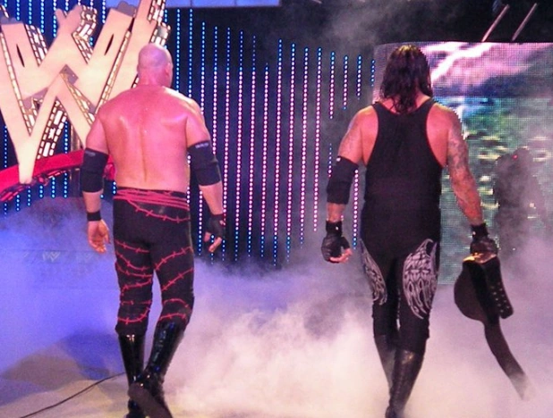 Undertaker and Kane walking. undertaker and kane. Undertaker and Kane walking.