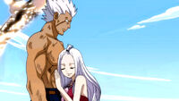 Mirajane depois de ser salvo por Elfman