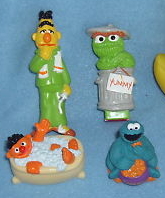 Toothpaste and toothbrush toppers 1998