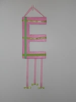 http://girlwearsglasses.blogspot.com/2011/05/miss-es-hair-accessory-organizer