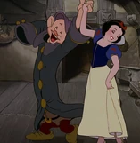 Blancanieves baila con Mudito