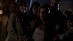 ScullyHeldByCrowd