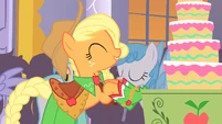 Applejack bringing apple cake into hall 2 S1E26