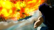 Natsu appears in front of Gajeel covered by his Flames