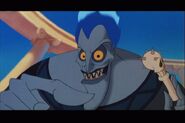 185px-Hades_holding_a_skull_pacifier_before_attempting_to_put_it_into_Baby_Hercules%27_mouth.jpg