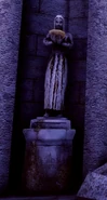 Statue holding bowl