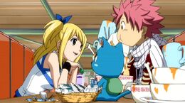 830px-Lucy treating Natsu and Happy to dinner