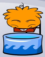 Orange puffle taking bath
