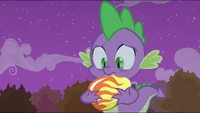Spike holding egg S2E21