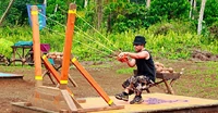 Lief fireing the sling shot