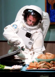 Astronaut making paninins