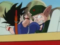 Oolong pushing Goku
