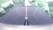 Oudo standing on the side of the clock tower