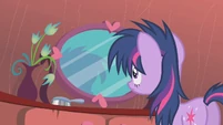 Twilight walking to dresser mirror S1E09