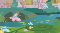 Butterflies flying over a stream in Ponyville S1E11
