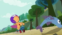 Scootaloo about to hit the fish S3E06