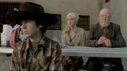 Carl Beth and Hershel listening