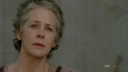 Carol listening to Rick's Speech