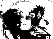 Gajeel punches Rogue