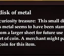 Small disk of metal