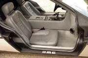The grey interior and manual transmission in a DMC-12.