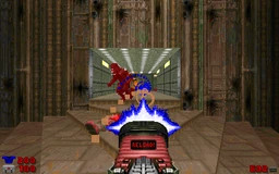 The player fends off a Blood Imp with the Auto-Railgun.
