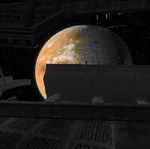 Telos IV visto desde el Devastador durante la batalla.