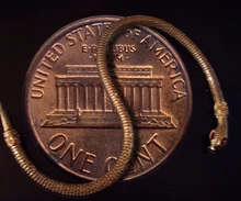 Flexible metal Micro-Snake with flashing eyes.