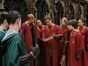 Oliver finds out that Professor Snape has given the Slytherin team permission to practice and to train their new Seeker.
