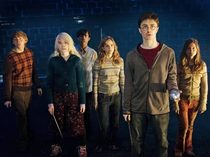 Ron, Luna, Neville, Hermione, Harry and Ginny in the Department of Mysteries.