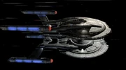 Die Columbia (unten) nimmt die Enterprise huckepack in ihrem Warpfeld mit.