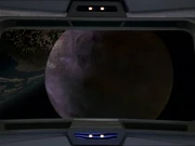 Rinax im Jahr 2371 umhüllt von der Metreonwolke.