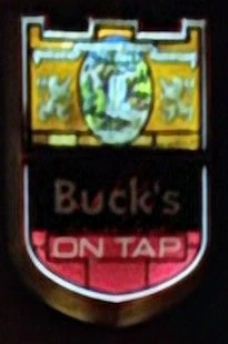 Sign advertising that Buck's beer is on tap.