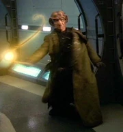A Ferengi using a 22nd Century Energy Whip