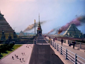 A city on Ventax II during the riots of 2367