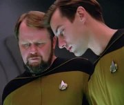 Crewman Wallace assisting Chief Engineer Argyle