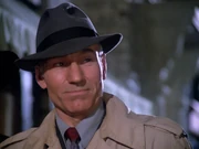 Picard in a Dixon Hill holographic novel.