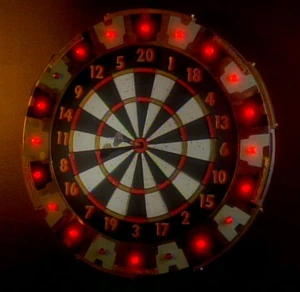 Bullseye! A top score for Miles O'Brien on Quark's much-used dartboard. (DS9: "Visionary")